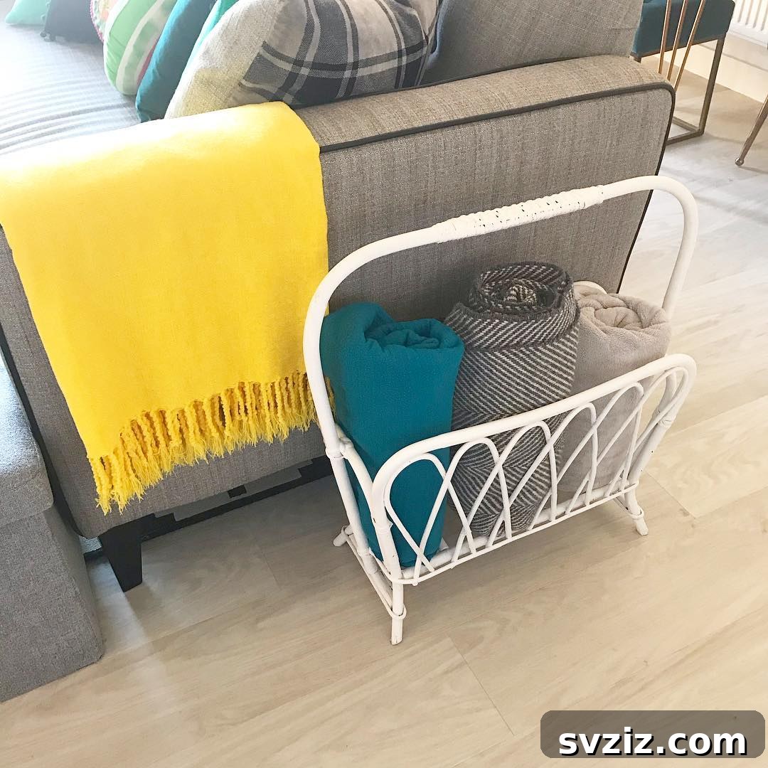 23 Clever Blanket Storage Solutions 20 Repurposed Magazine Rack for Blanket Storage in a Bedroom