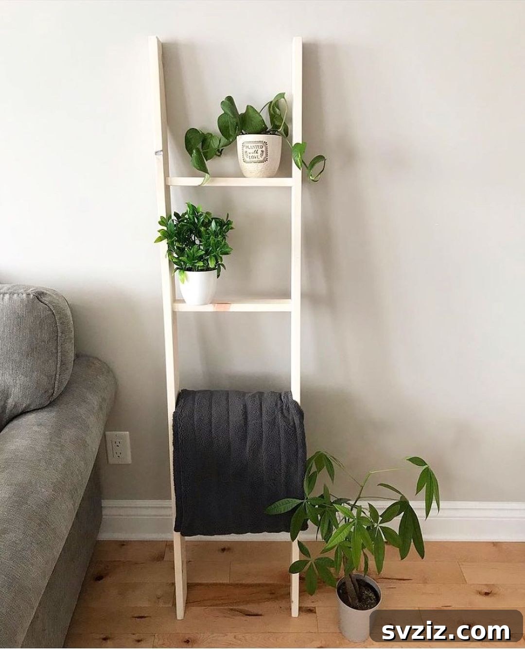 23 Clever Blanket Storage Solutions 23 Boho Plant and Blanket Ladder Decor