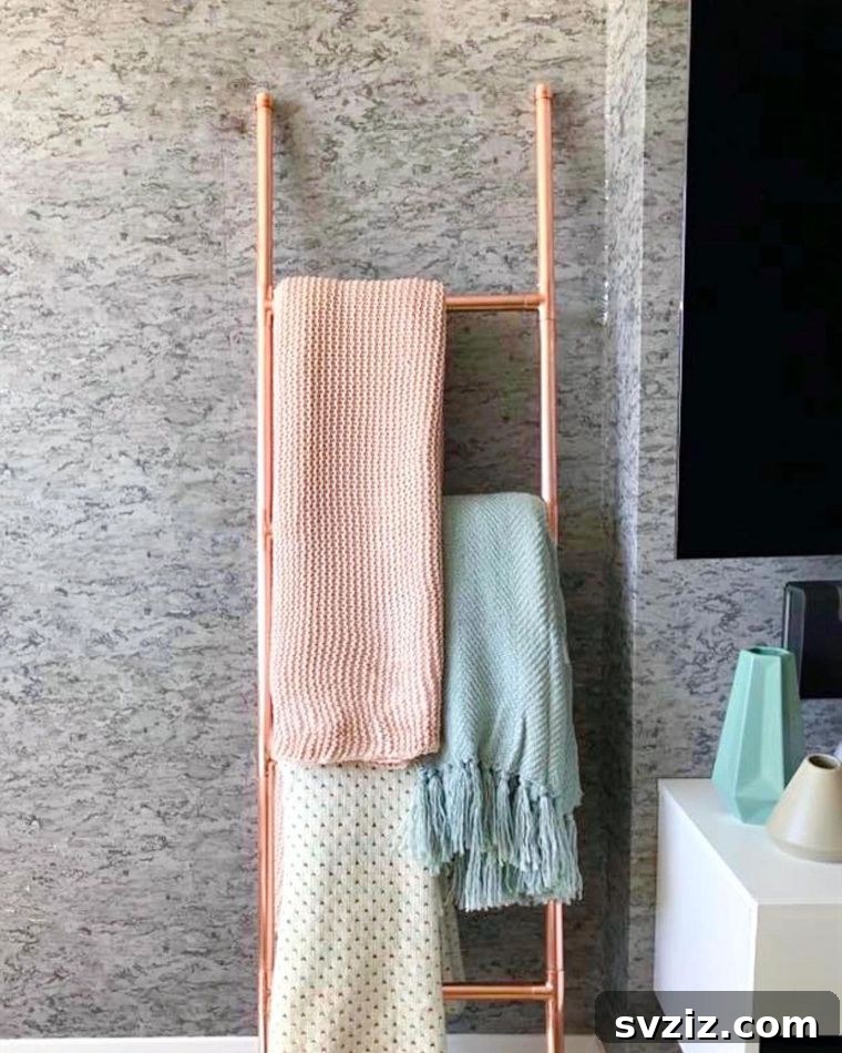 23 Clever Blanket Storage Solutions 5 Chic Rose Gold Ladder for Decorative Blanket Storage