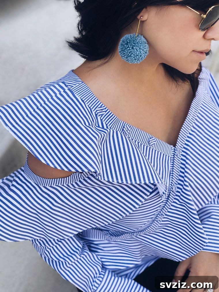 Sleek Pom-Pom Earrings