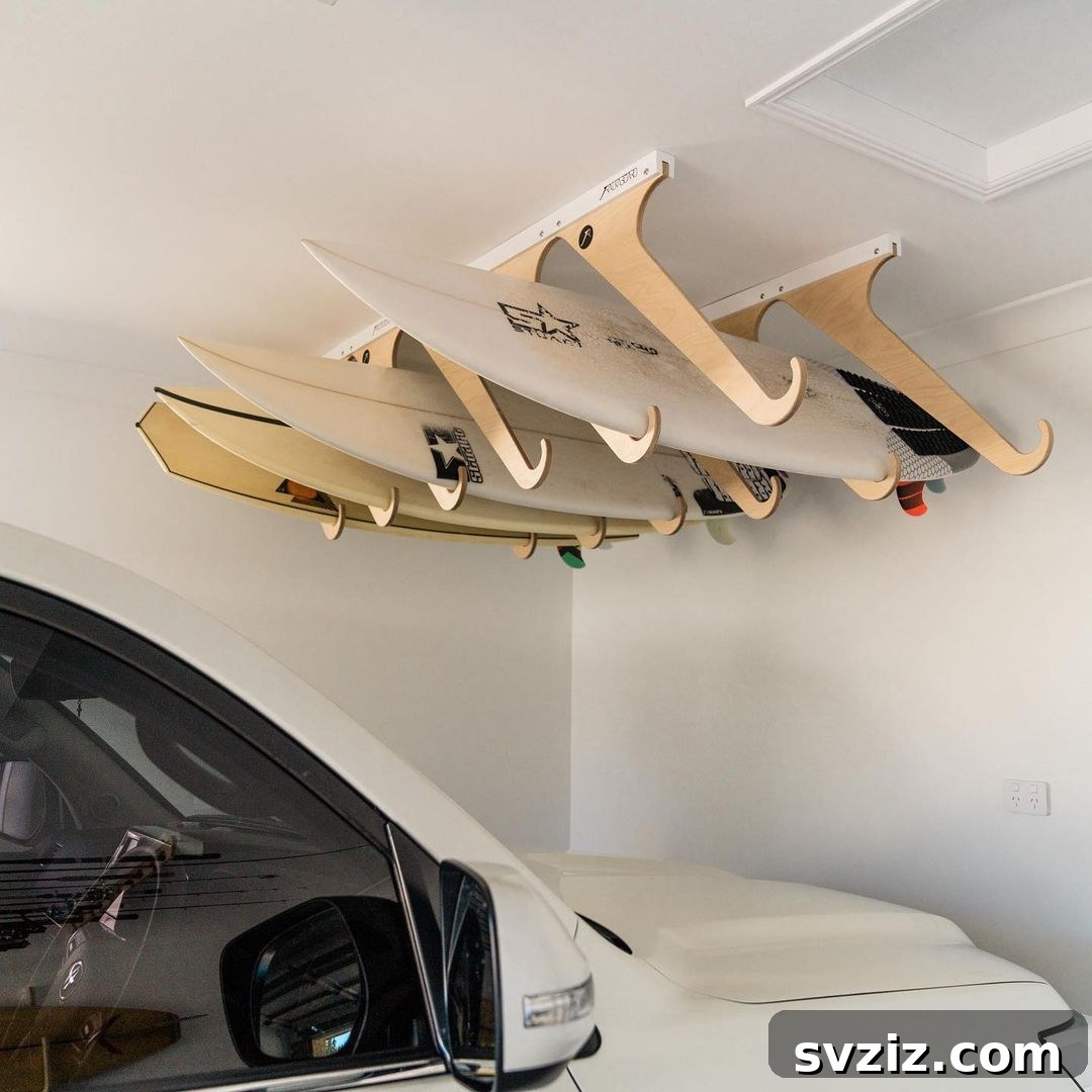 21 Genius Garage Ceiling Storage Ideas for Ultimate Space Saving 16 Tilted surfboard storage and display in garage