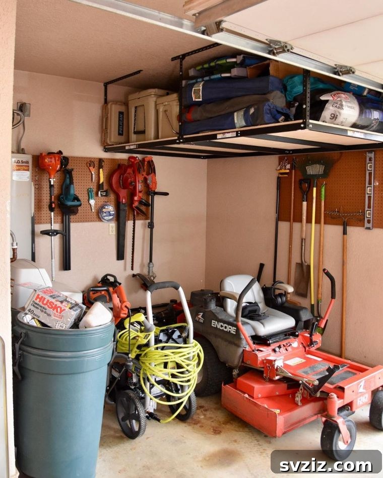 21 Genius Garage Ceiling Storage Ideas for Ultimate Space Saving 18 Overhead storage for camping equipment in garage