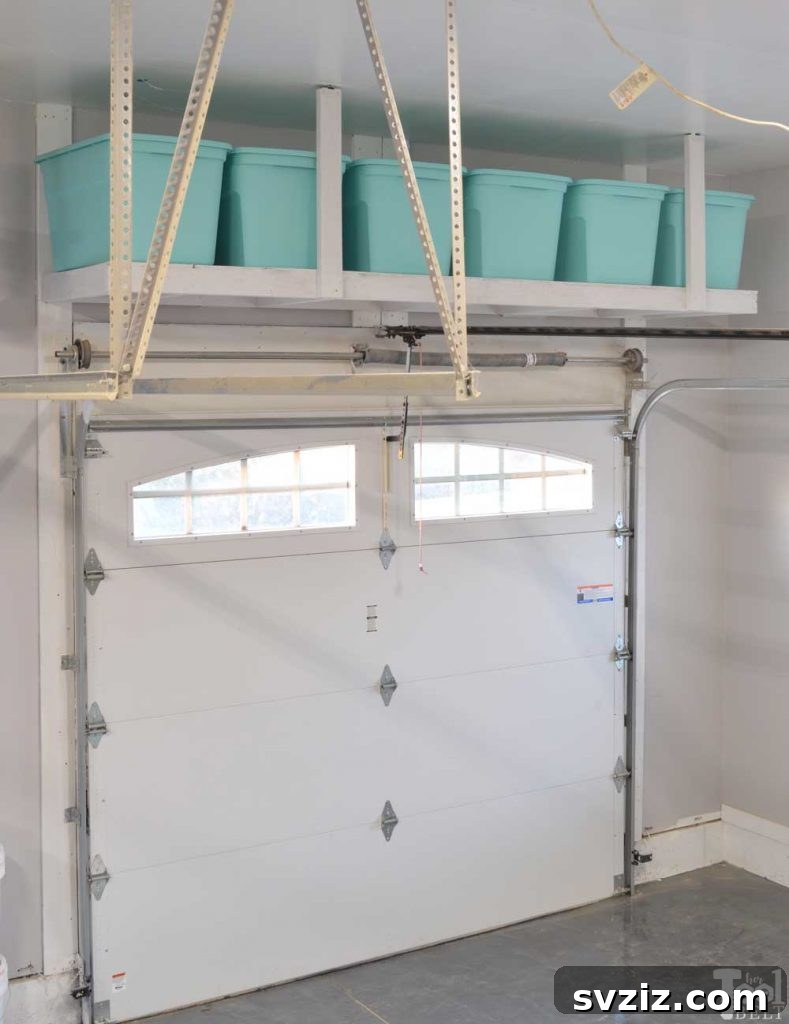 21 Genius Garage Ceiling Storage Ideas for Ultimate Space Saving 6 Wooden pallet shelf for garage ceiling storage