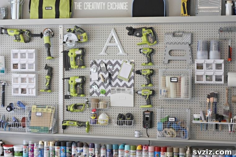 Full wall pegboard organization system in a garage workshop