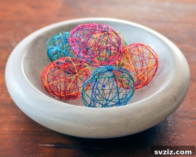 25 Egg-cellent Easter Crafts for Kids 12 String Easter Eggs
