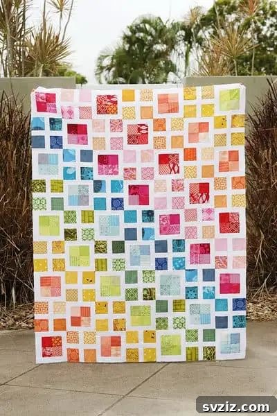 Beautiful Rainbow Scrappy Lattice Quilt Pattern showcasing colorful fabric pieces.