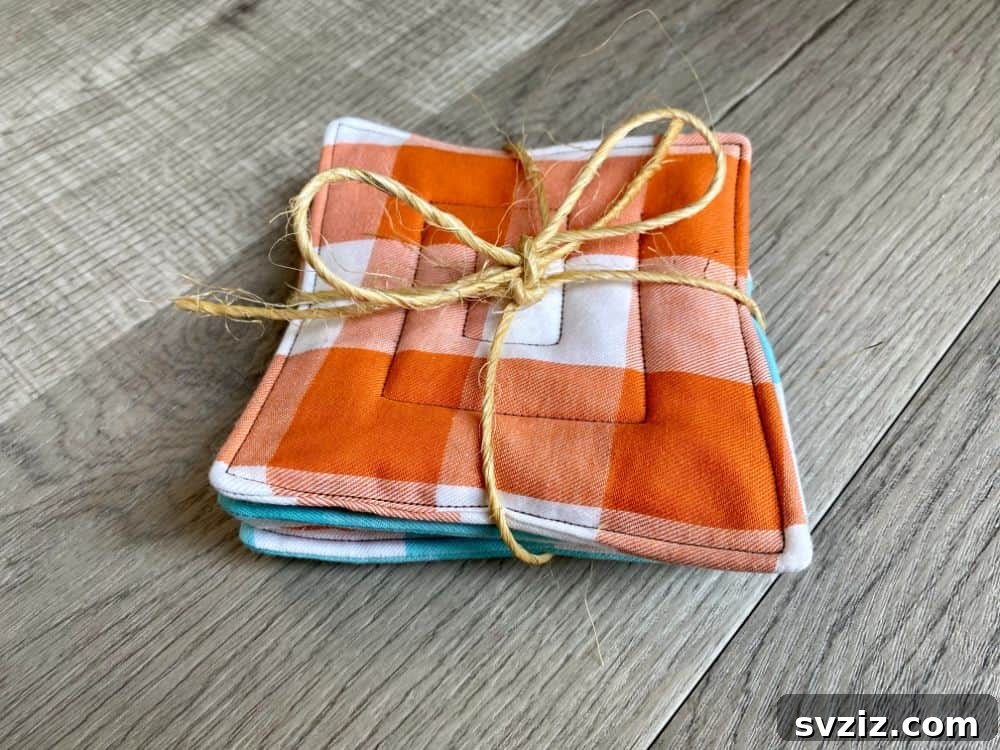 Quilted Fabric Coasters crafted from colorful fabric scraps, protecting surfaces.