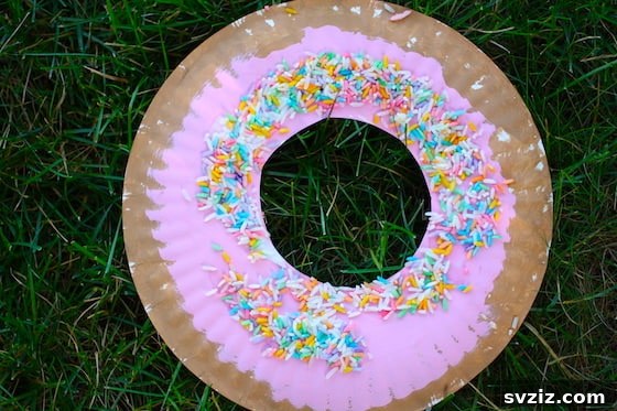 31 Fun Toddler Crafts They'll Adore 34 Fun paper plate donut craft with colorful sprinkles