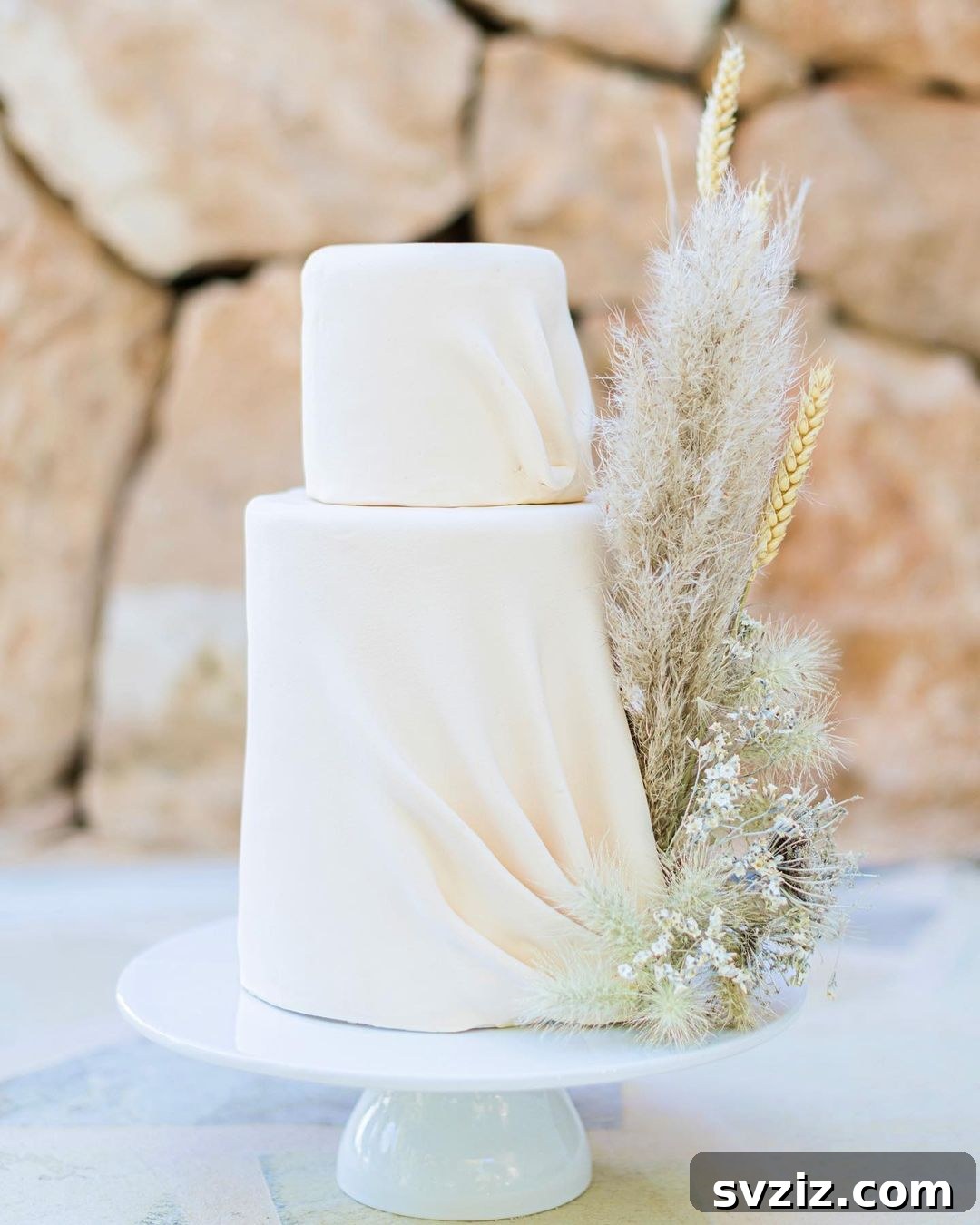 draped cake with grass