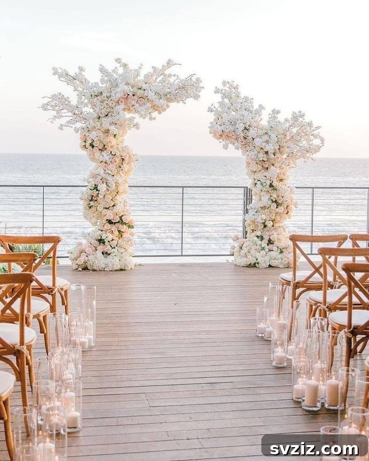 candles and white floral arches