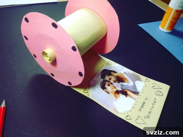 DIY Camera Film Photo Album displaying photos like a film roll