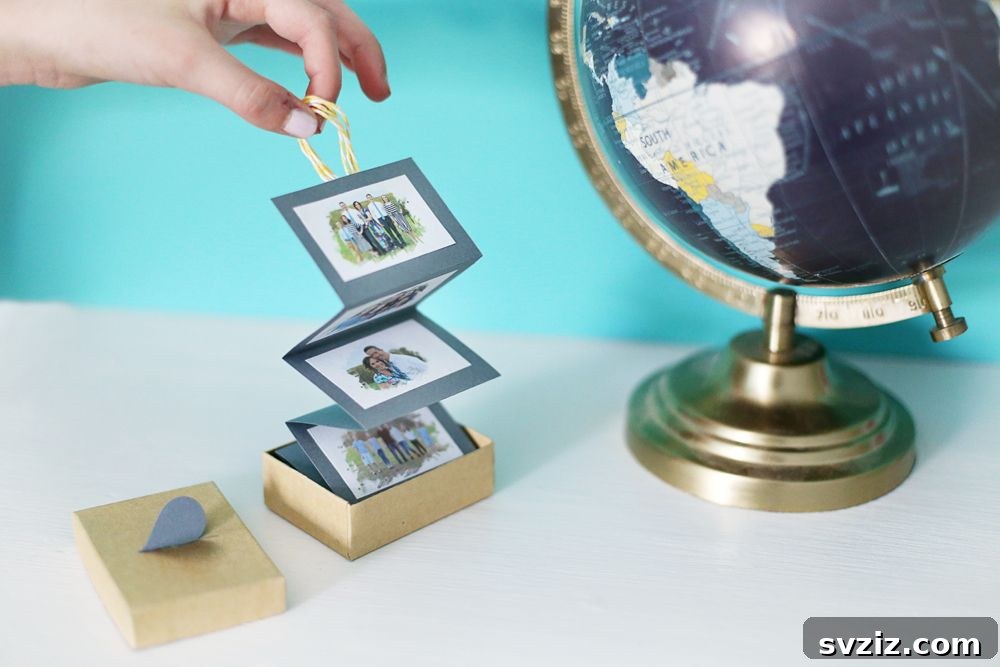 Accordion Photo Box with photos folding out