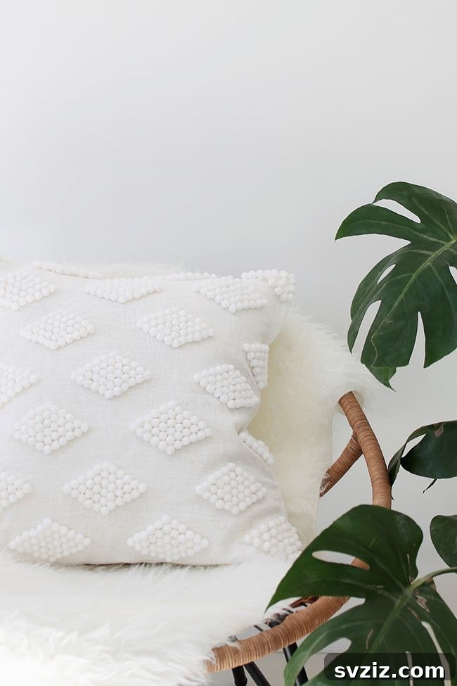 Crafted Wedding Gifts: High-End Style, Wallet-Friendly Price 17 Playful DIY Pom Pom Pillow, a modern and fun handmade wedding gift