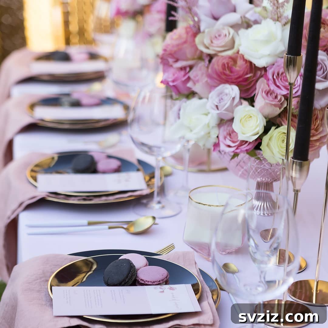 Modern wedding table with a striking gold, black, and pink color scheme.