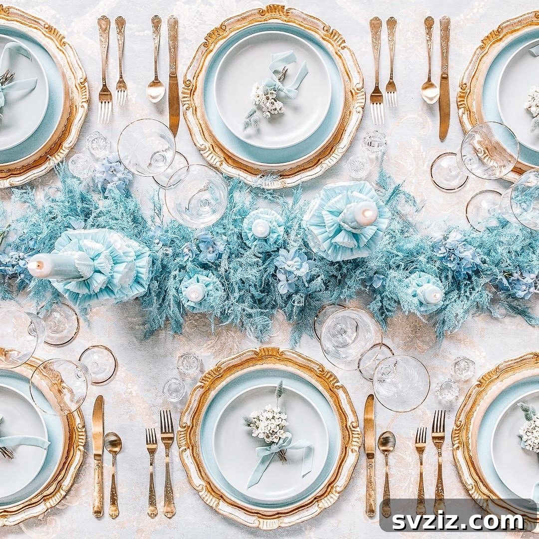 Regal Winter Blue Table decor with shimmering gold accents, creating an opulent atmosphere.