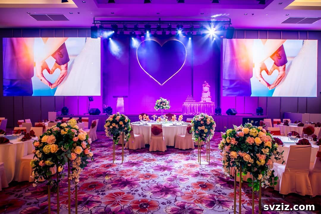 31 Next-Level Wedding Reception Ideas 17 Wedding reception with personalized purple lighting and screen