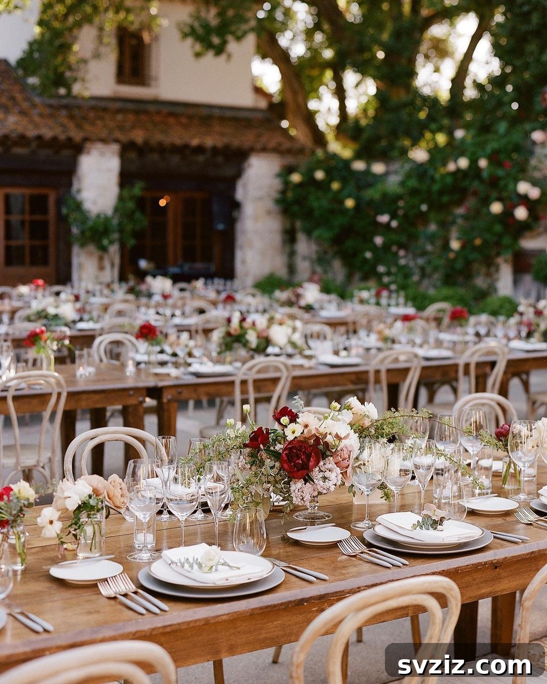 31 Next-Level Wedding Reception Ideas 18 Elaborate outdoor dinner tables at a grand wedding reception