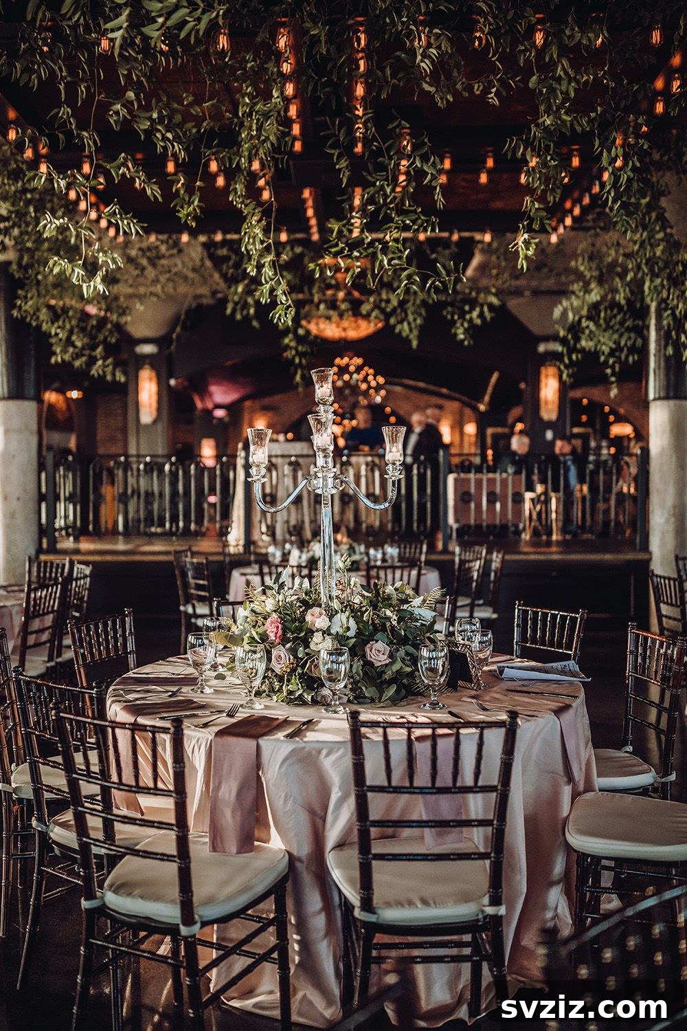31 Next-Level Wedding Reception Ideas 21 Mysterious and magical wedding reception with dark wood and pink accents
