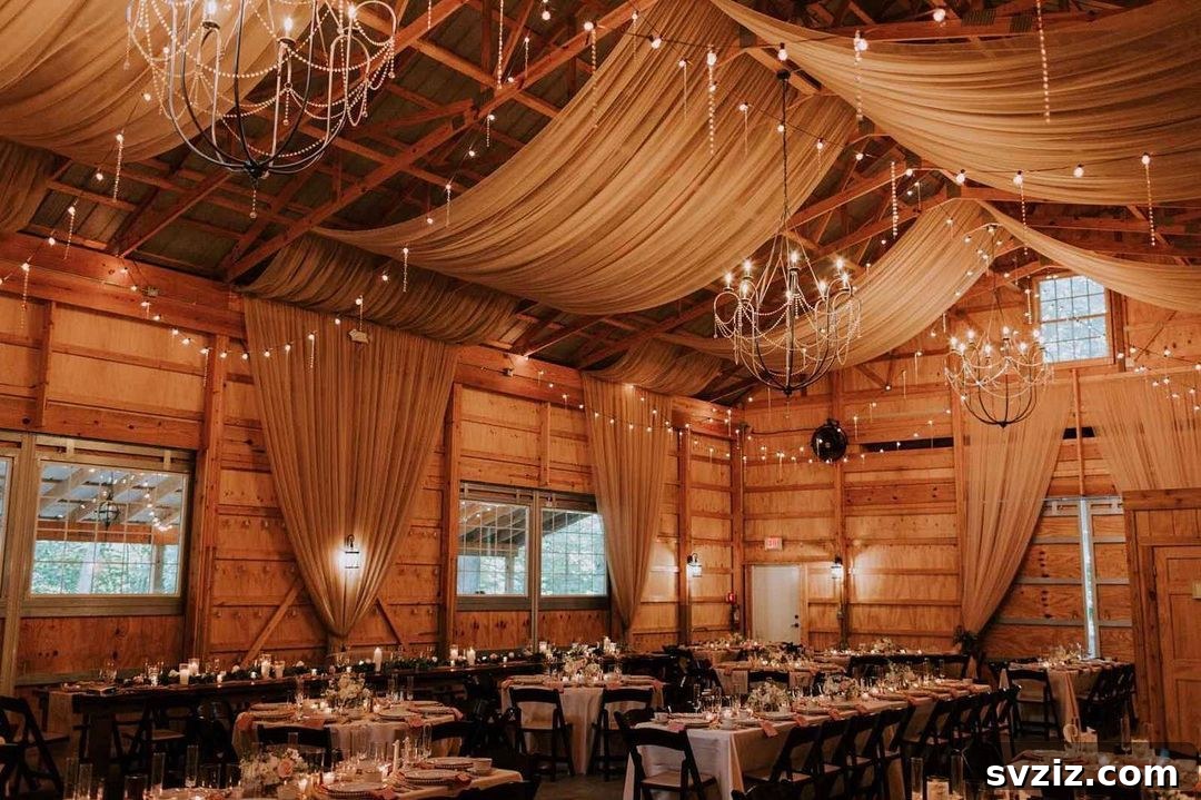 31 Next-Level Wedding Reception Ideas 29 Upscale barn wedding reception with metallic gold and woodsy decor