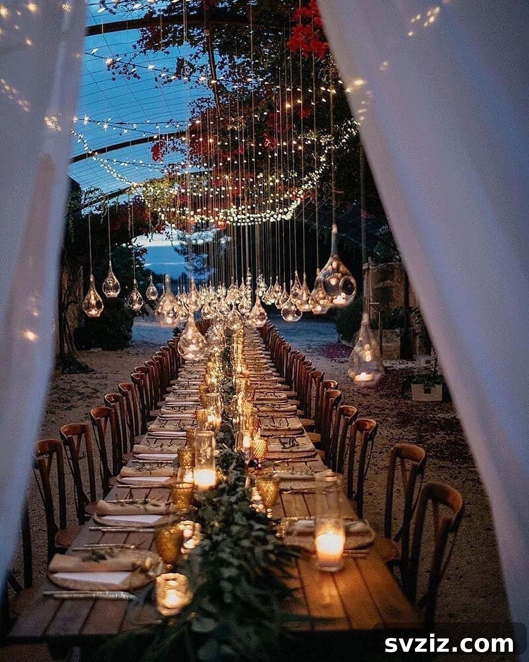 31 Next-Level Wedding Reception Ideas 31 Romantic outdoor wedding reception with hanging glass lanterns