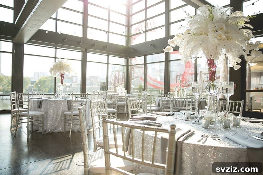 31 Next-Level Wedding Reception Ideas 33 Glamorous silver and glitter wedding reception decor with bright natural light